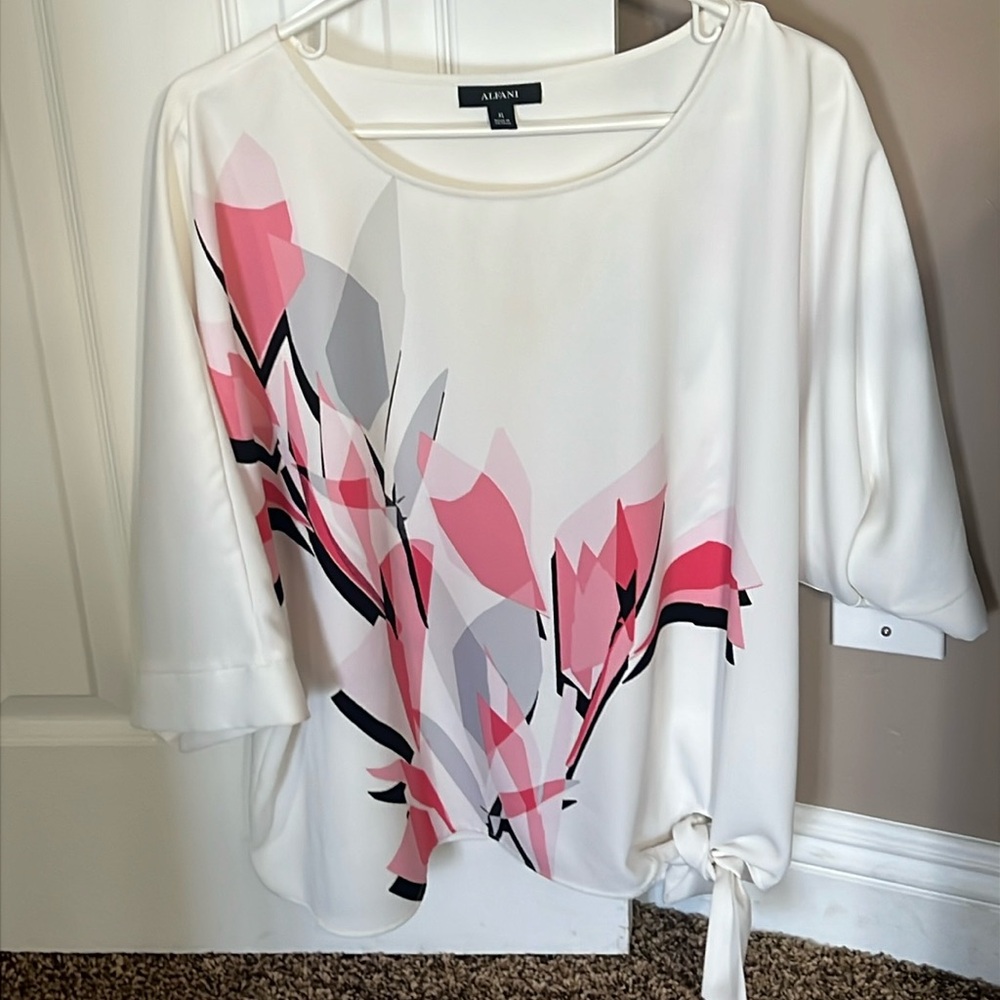 Alfani Women’s blouse with tie at the bottom.
